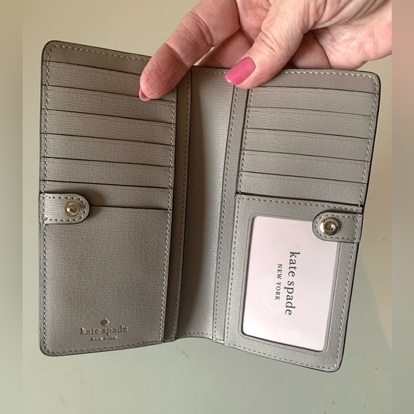 kate spade Handbags - Kate Spade Taupe BiFold Wallet